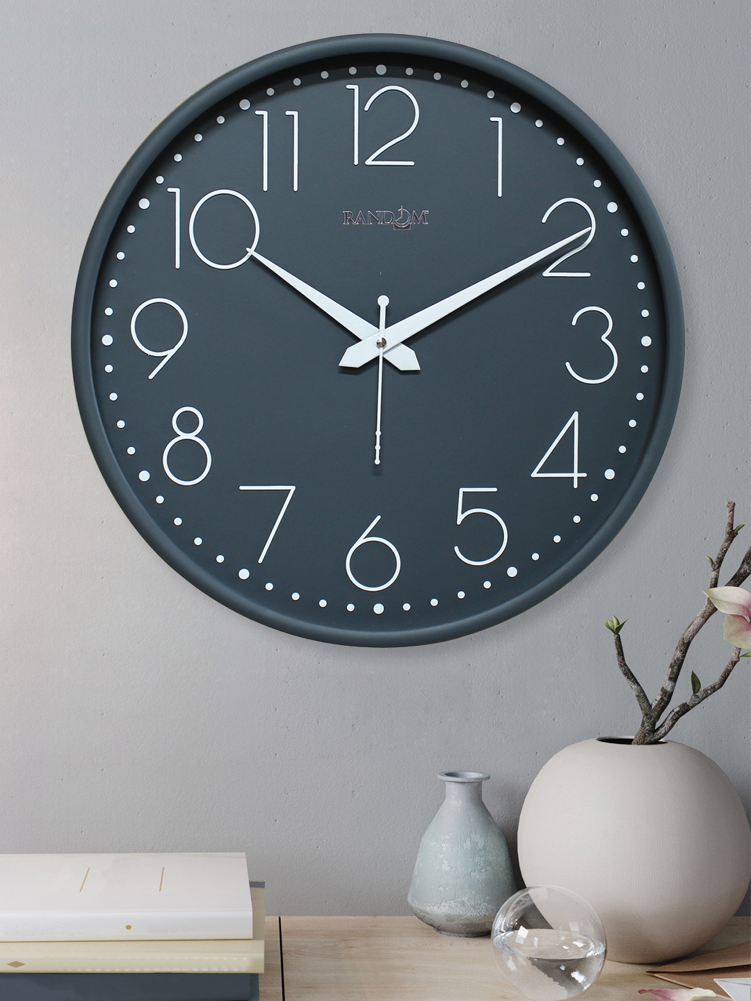 

RANDOM Embossed Grey & White Printed Contemporary Wall Clock