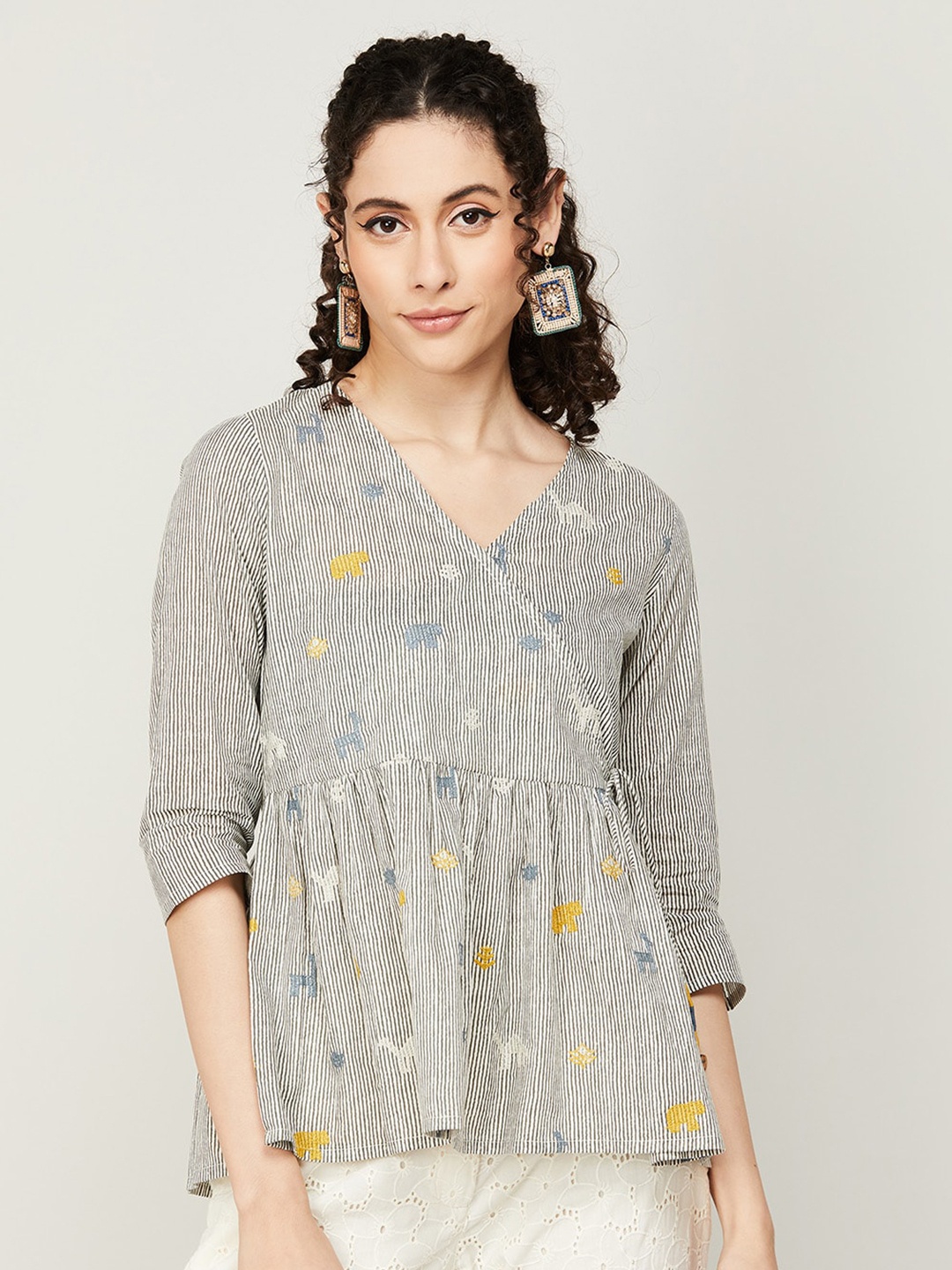 

Colour Me by Melange Off White Striped Empire Top