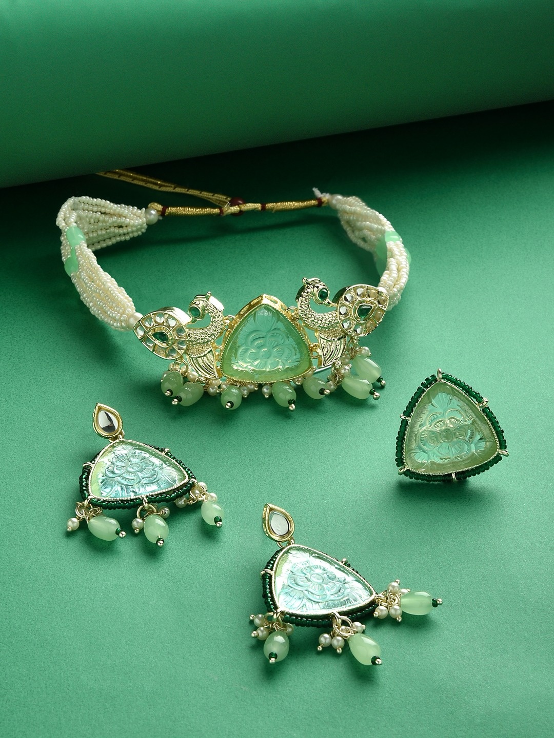 

Zaveri Pearls Gold-Plated Stone-Studded & Pearl Beaded Jewellery Set