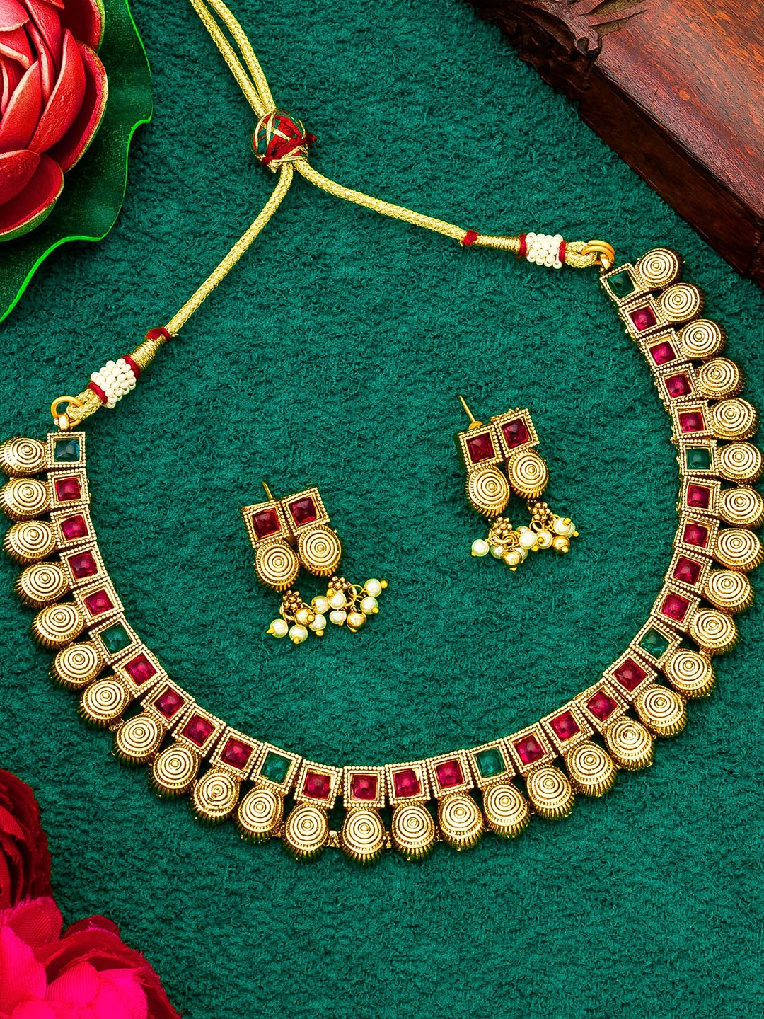 

aadita Gold-Plated Stones Studded & Beaded Jewellery Set