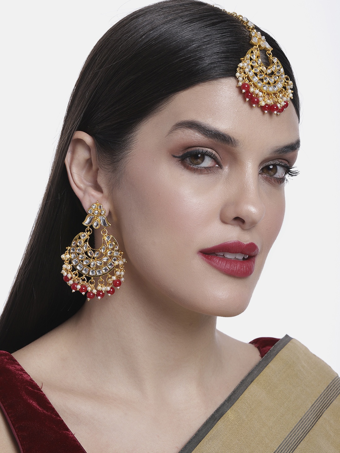

Peora Traditional Gold-Plated Kundan & Pearl Maang Tika & Chandbali Earrings Jewellery Set, Red