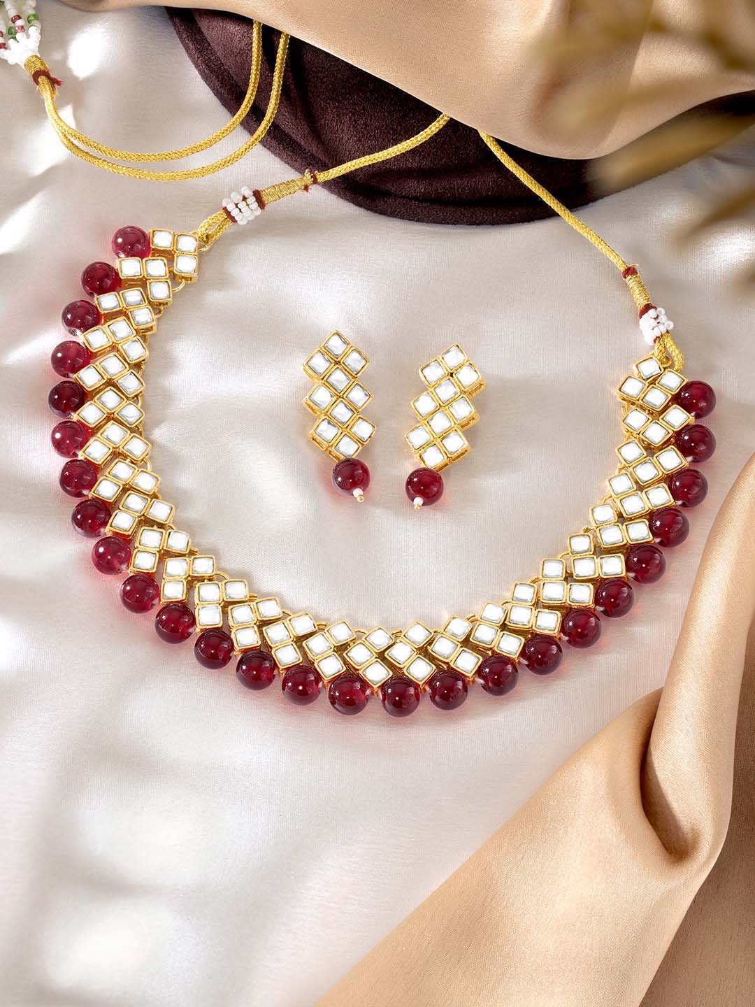 

Peora Gold Plated Maroon Kundan & Pearl Studded Choker Necklace with Earrings