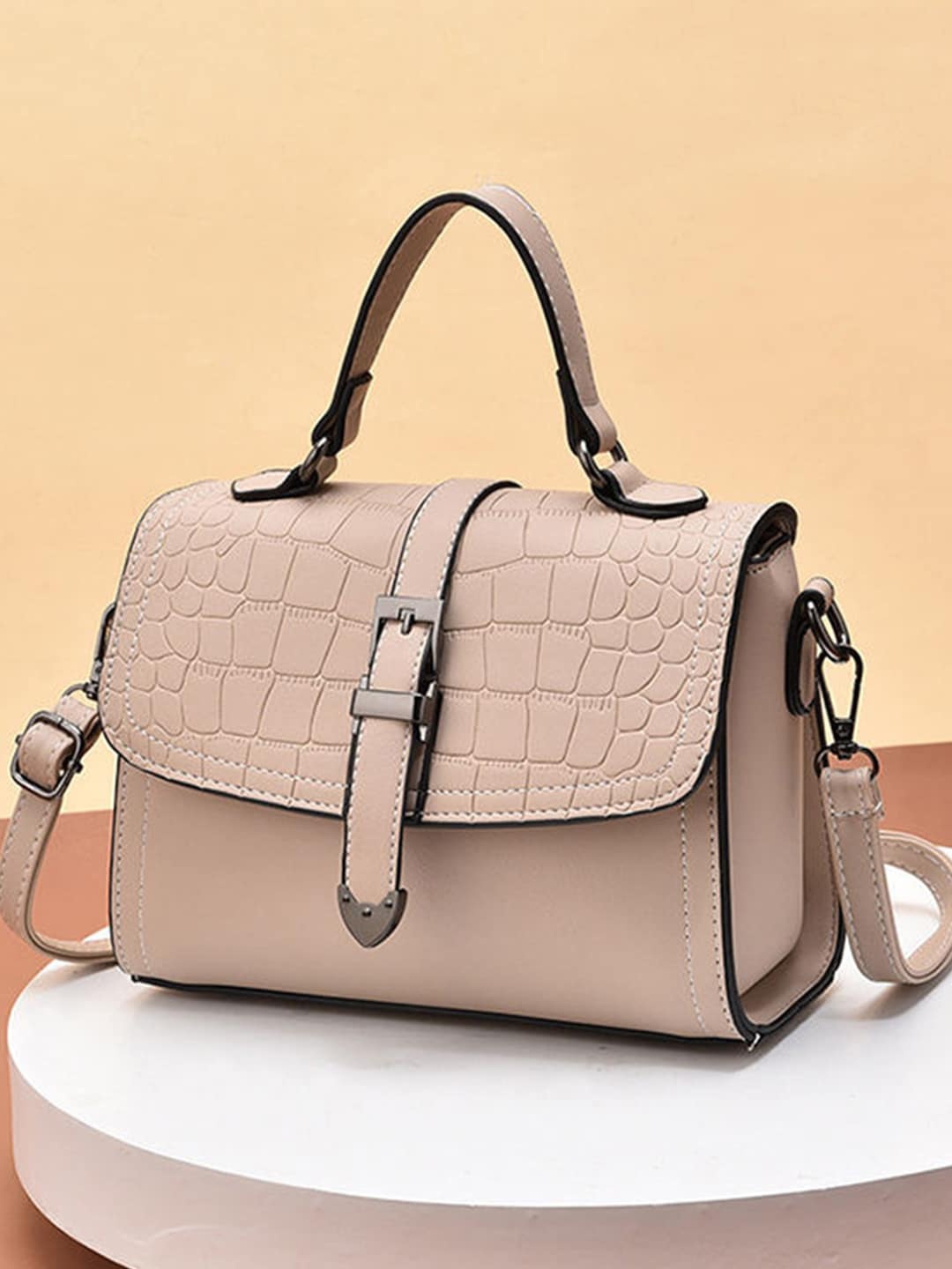 

Angeline Textured Oversized Bowling Sling Bag, Beige