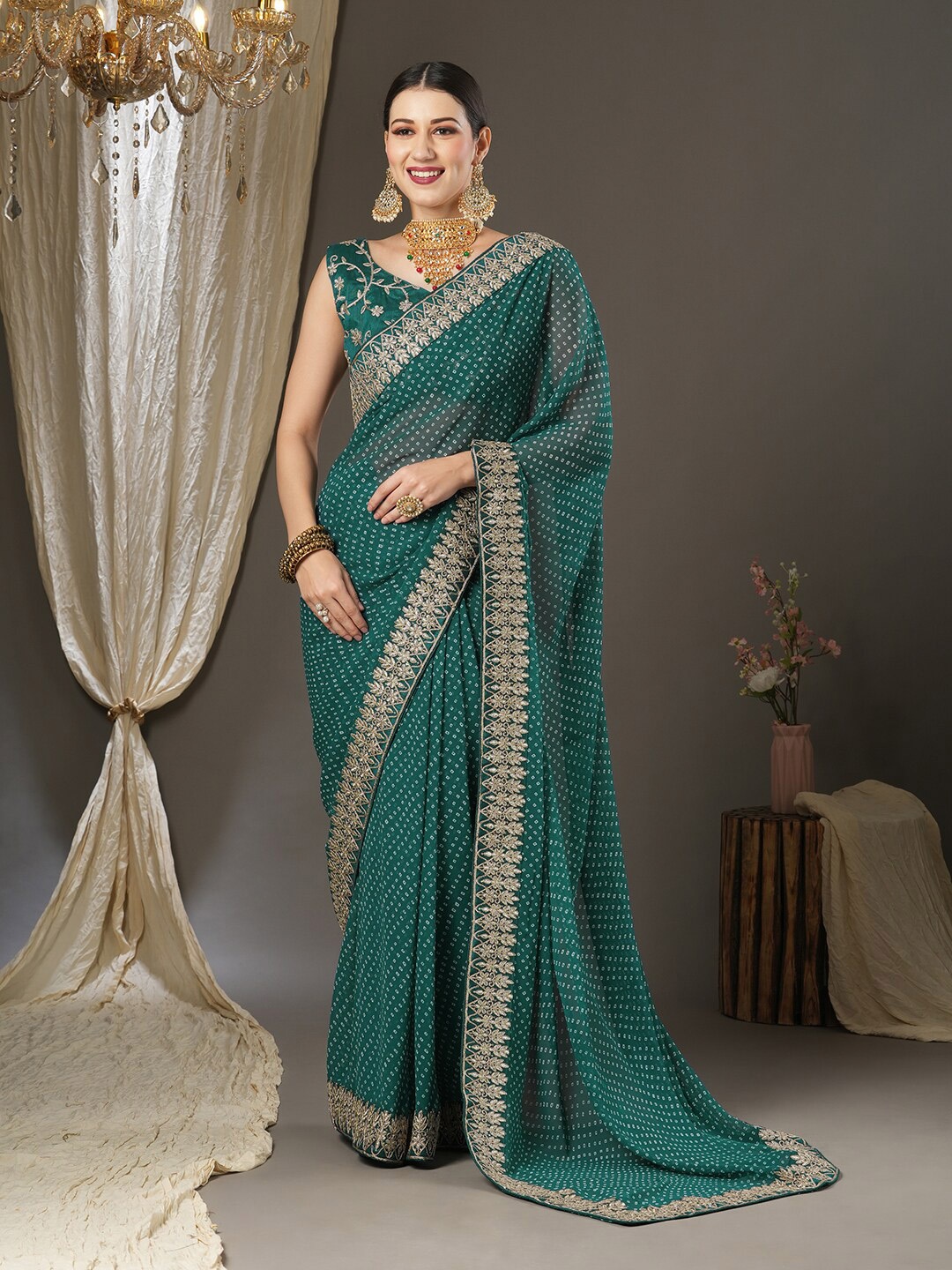 

Saree mall Bandhani Printed Embroidered Border Pure Georgette Saree, Teal