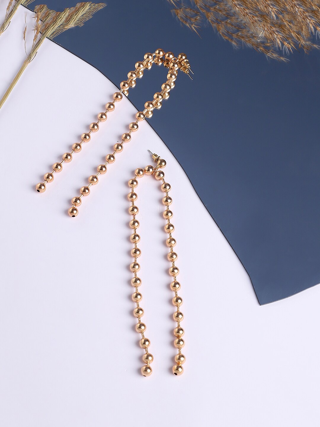 

SOHI Gold-Plated Contemporary Drop Earrings