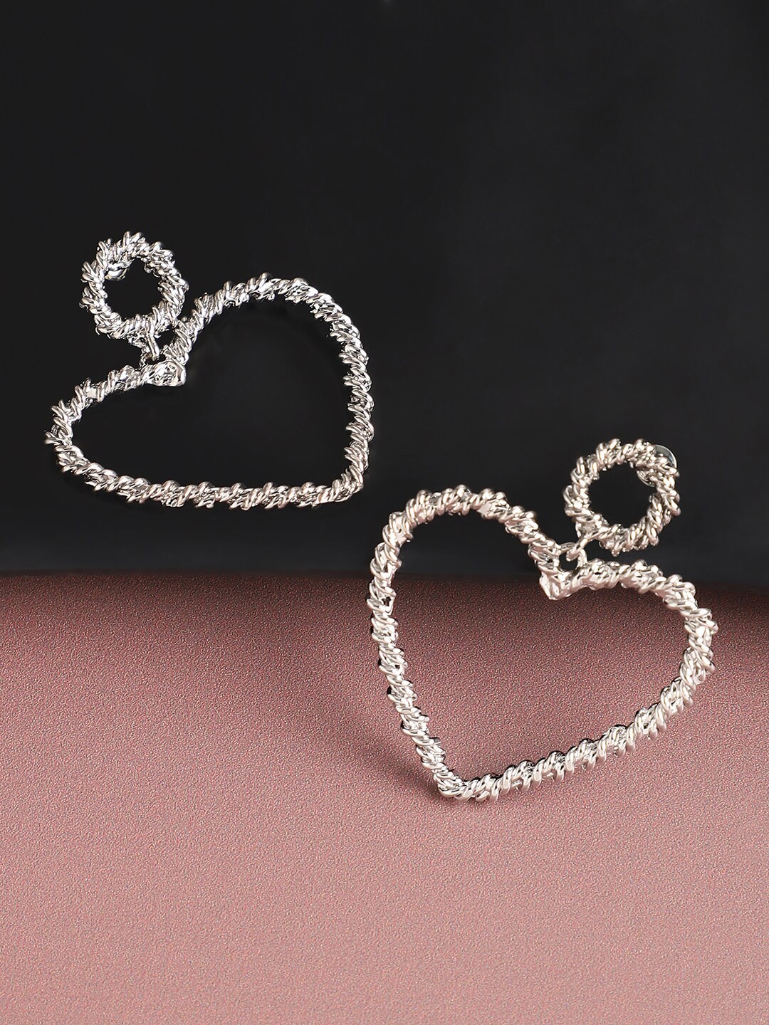 

SOHI Silver-Plated Contemporary Drop Earrings