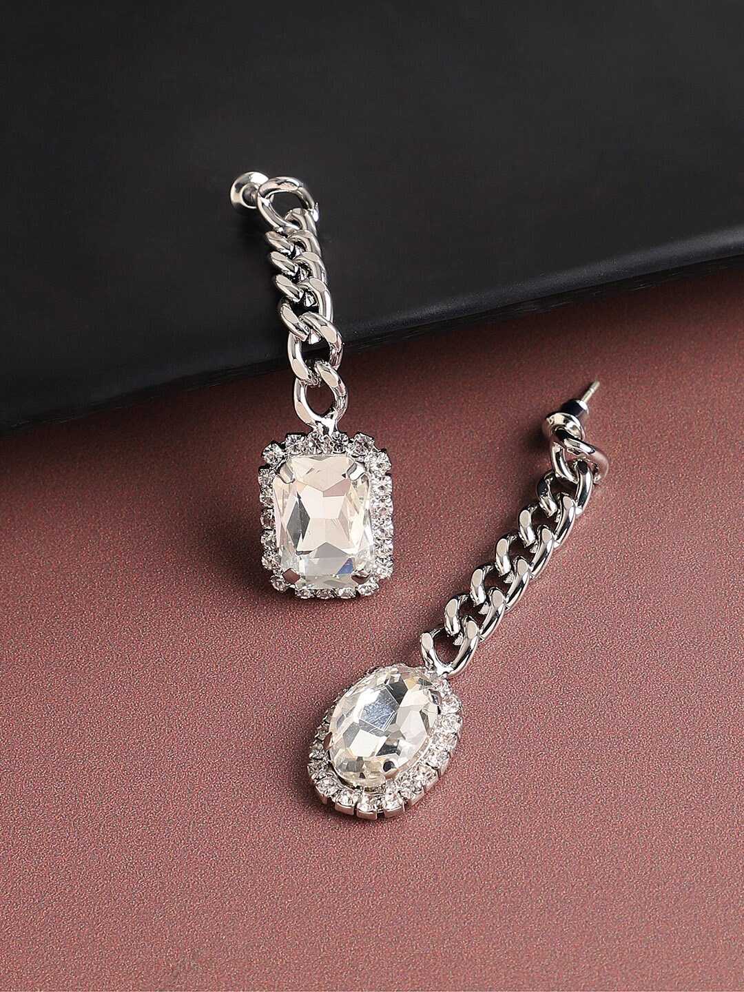 

SOHI Silver-Plated Contemporary Drop Earrings