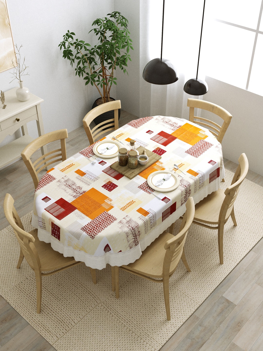

Clasiko Orange & Maroon Geometric Printed 6 Seater Oval Dining Table Cover