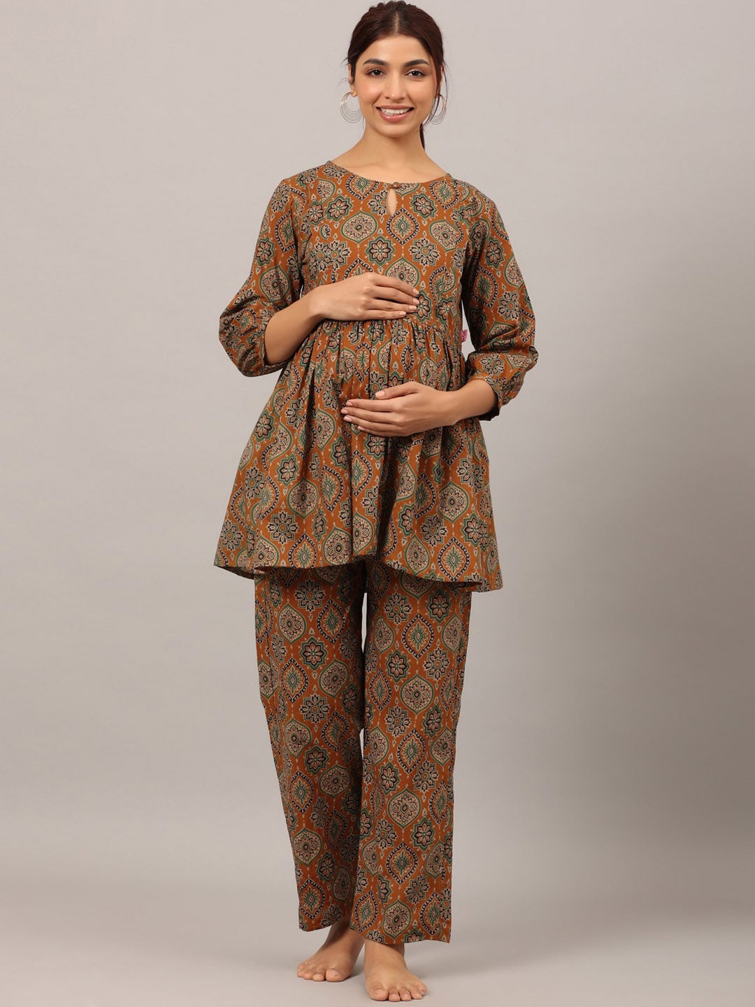 

Ikk Kudi by Seerat Ethnic Motifs Printed Maternity Nightsuit, Mustard