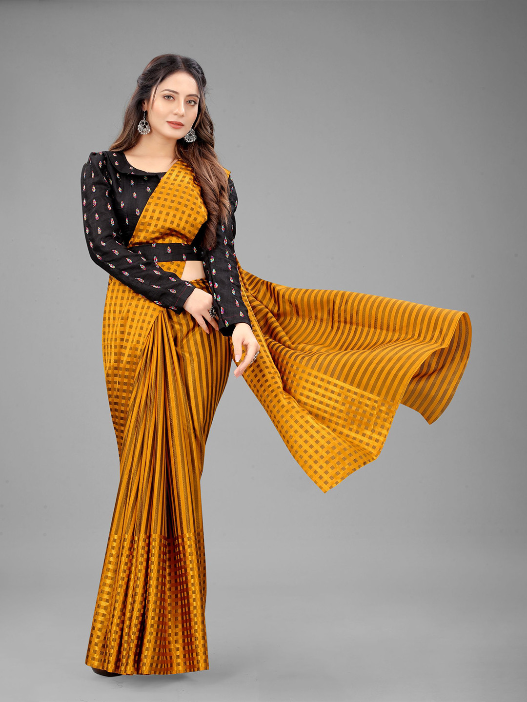 

Rangrasiya Corporation Striped Satin Ikat Saree, Mustard