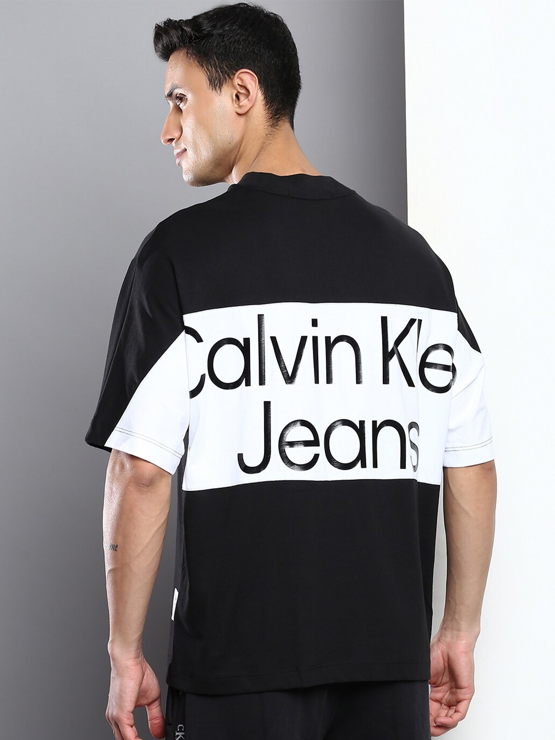 

Calvin Klein Jeans Men Typography Printed Pure Cotton T-shirt, Black