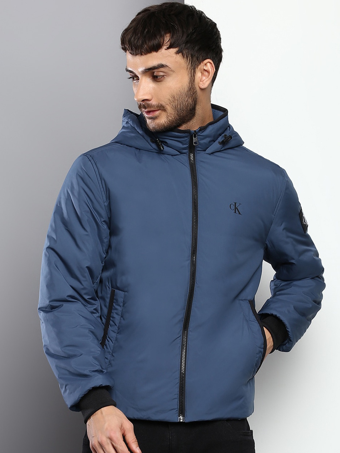 

Calvin Klein Jeans Men Solid Hooded Bomber Jacket, Navy blue