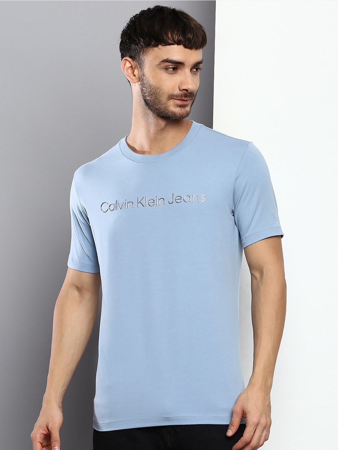 

Calvin Klein Jeans Men Blue Brand Logo Printed T-shirt