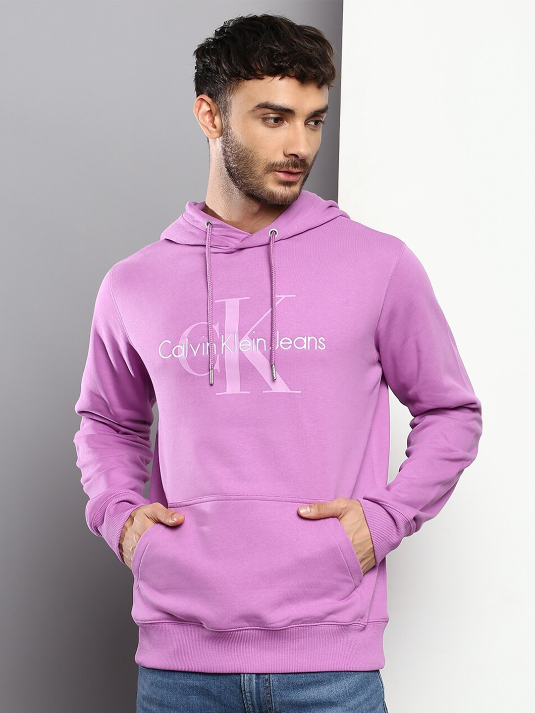

Calvin Klein Jeans Men Cotton Printed Hooded Sweatshirt, Purple