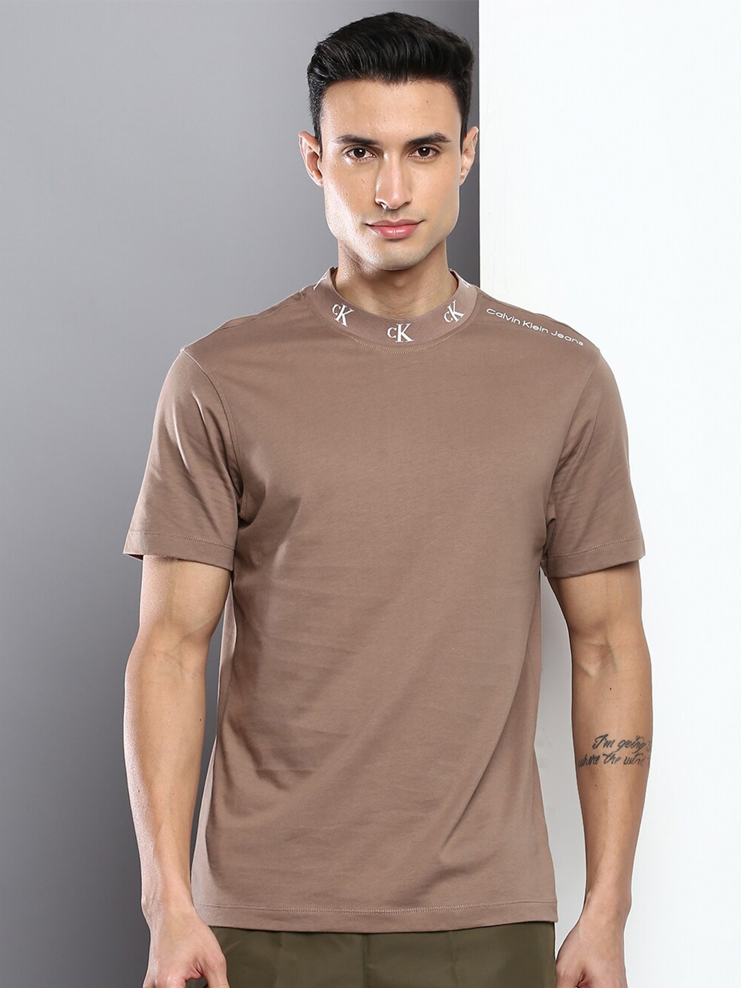 

Calvin Klein Jeans Men Solid Organic Cotton T-shirt, Brown