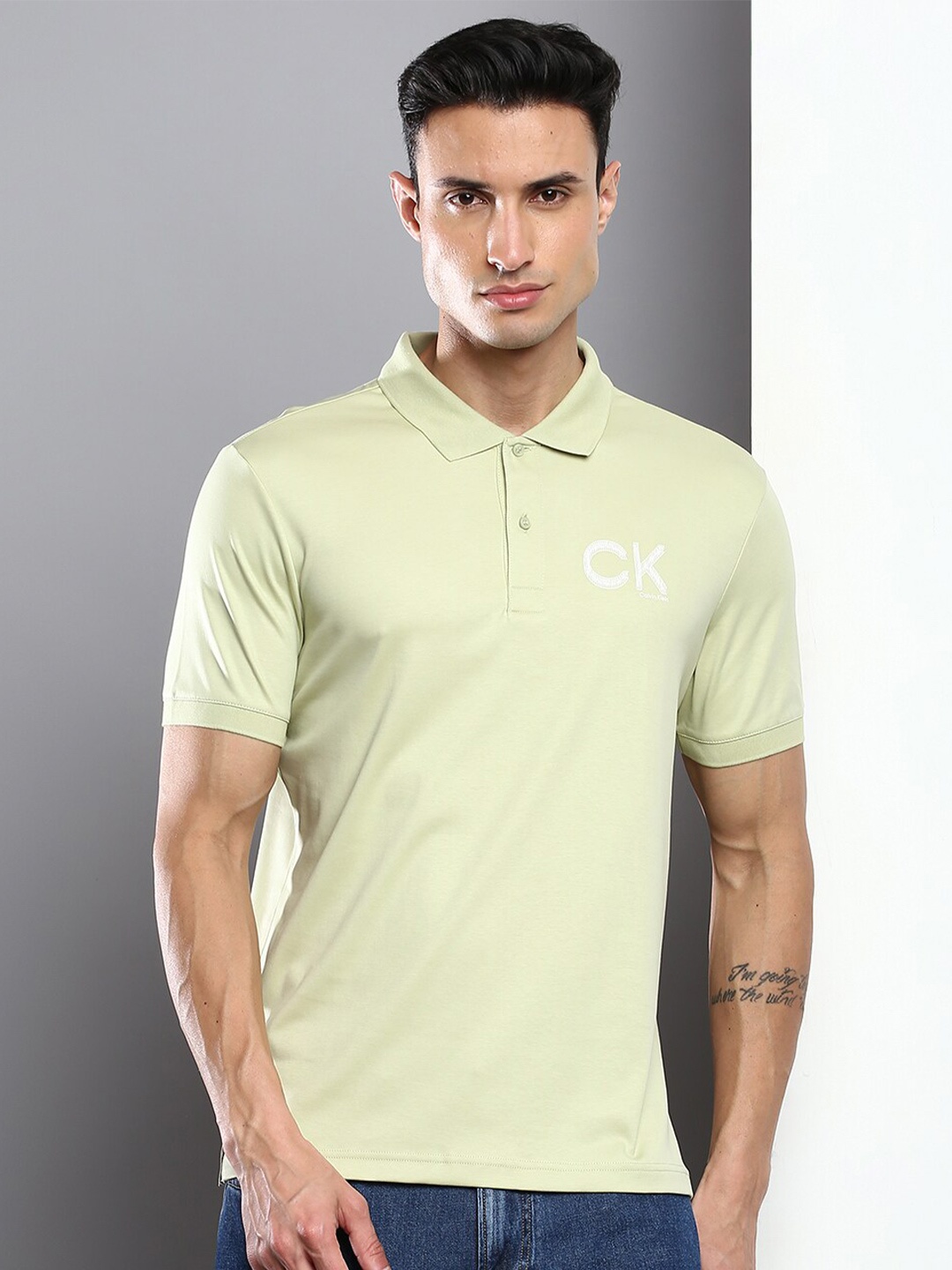 

Calvin Klein Jeans Men Solid Polo Collar Cotton T-shirt, Green