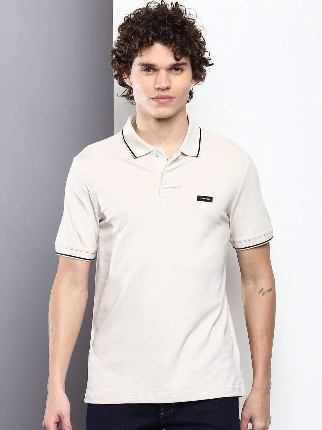 

Calvin Klein Jeans Men Cotton Polo Collar T-shirt, Beige