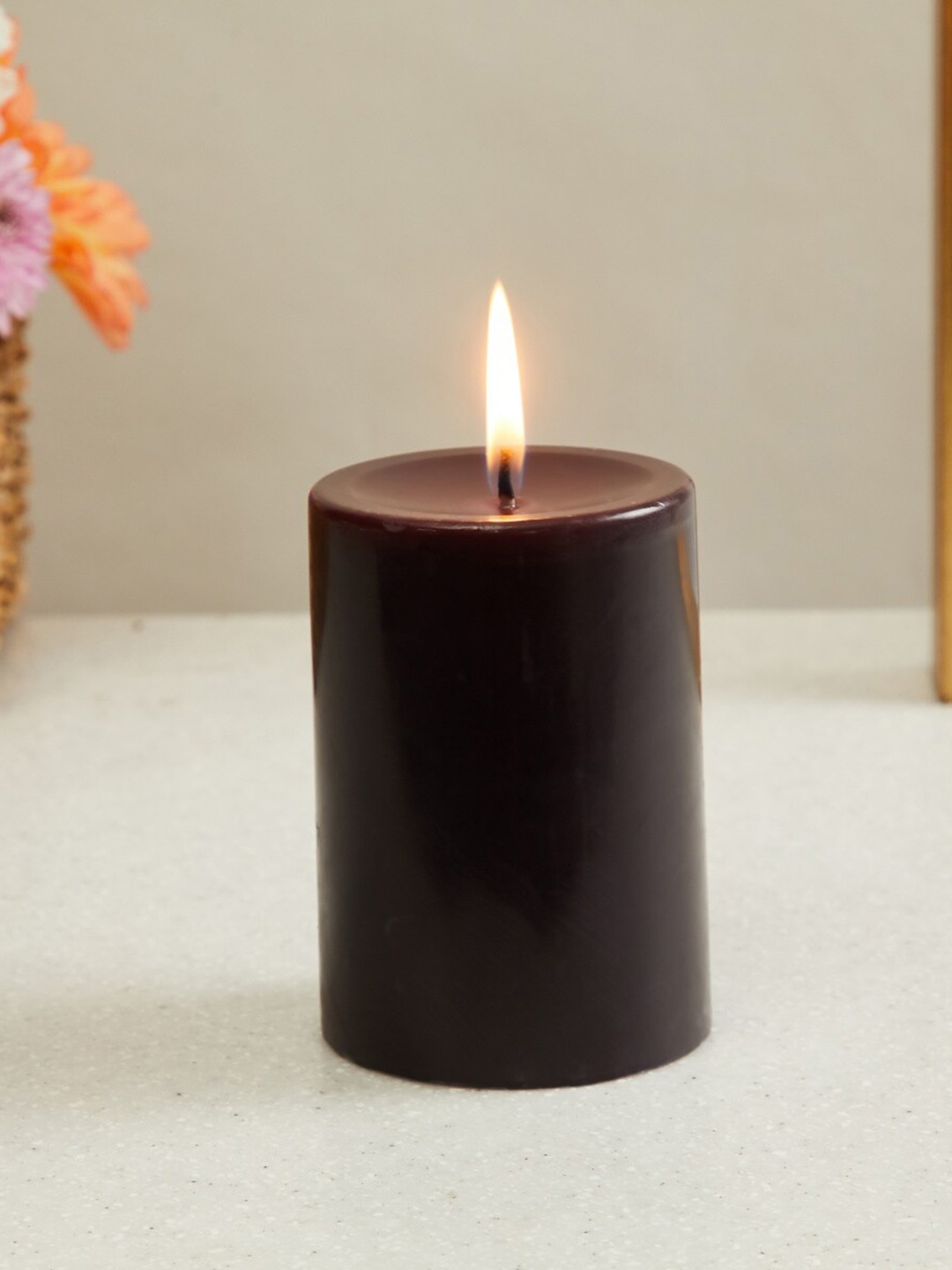 

Home Centre Color Connect Black Wax Musk Pillar Candle