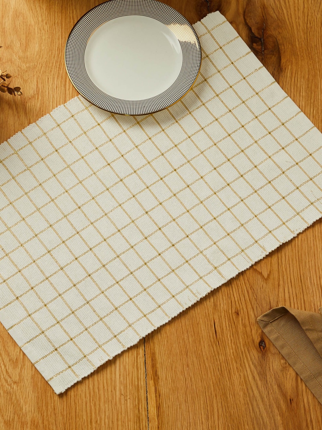 

Home Centre Glitz White & Gold Toned Checked Cotton Table Placemat
