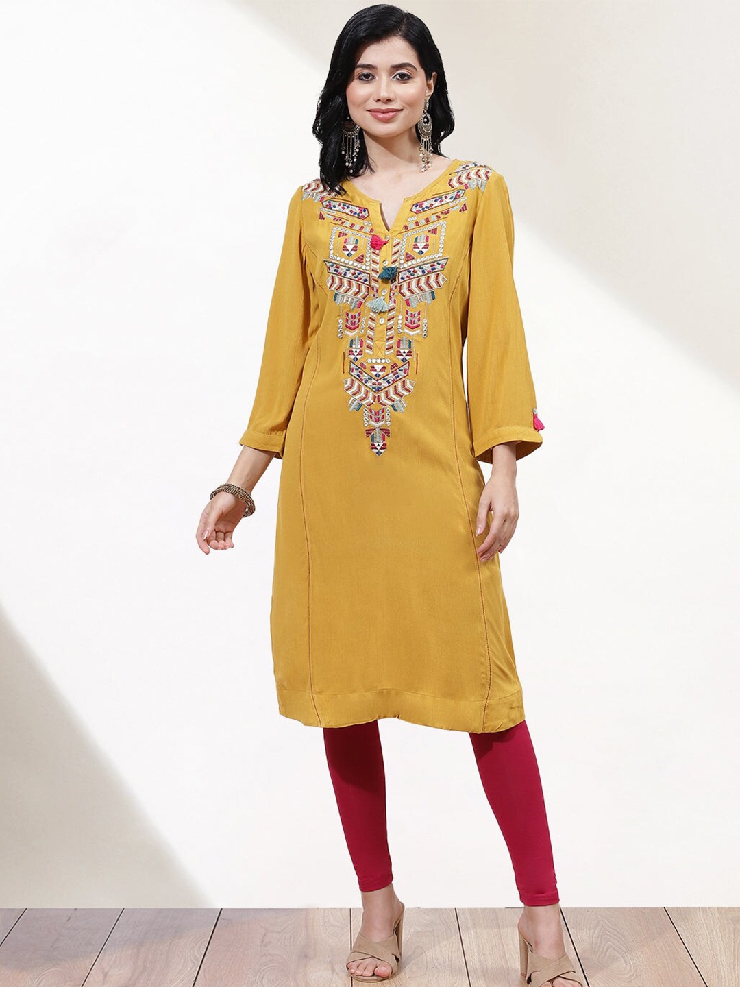 

Lakshita Women Ethnic Motifs Yoke Design Thread Work Crepe Kurta, Mustard