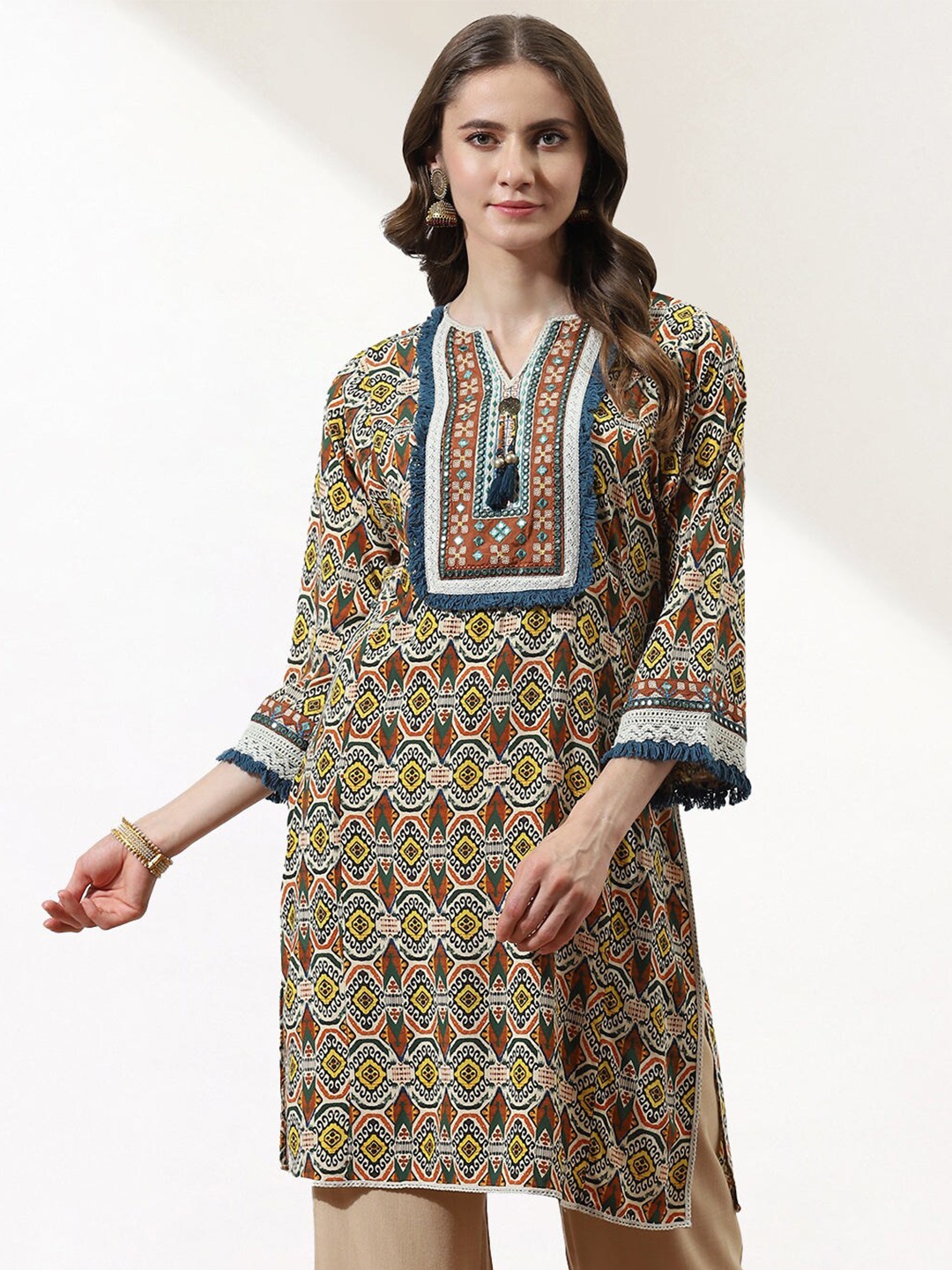 

Lakshita Women Ethnic Motifs Printed V-Neck Thread Work Kurti, Green