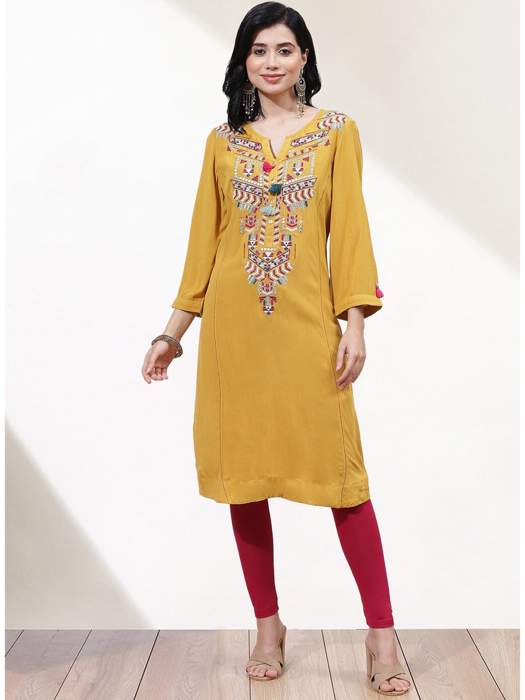 

Lakshita Women Ethnic Motifs Yoke Design Thread Work Crepe Kurta, Mustard