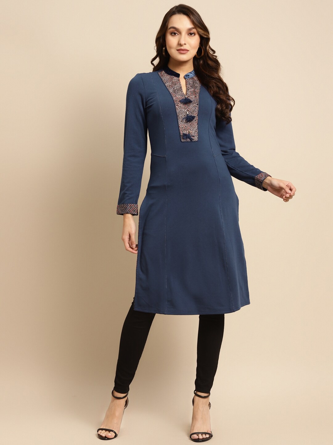 

Lakshita Women Navy Blue & White Ethnic Motifs Embroidered Mandarin Collar Kurta