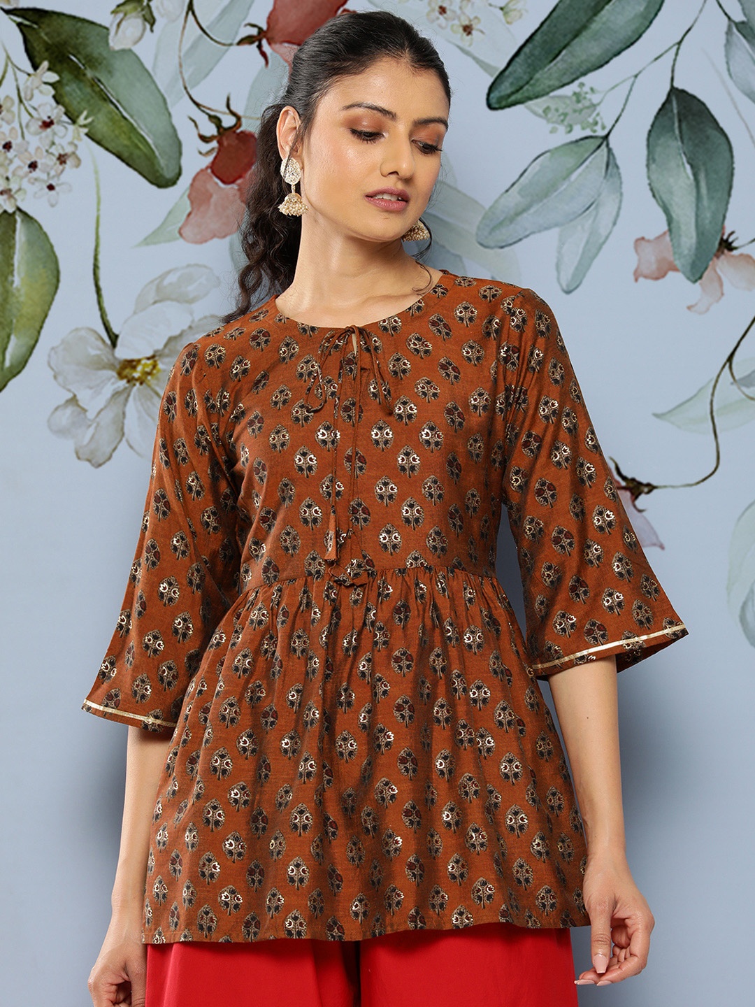 

Libas Floral Printed Tie-Up Neck Flared Sleeves Empire Kurti, Rust