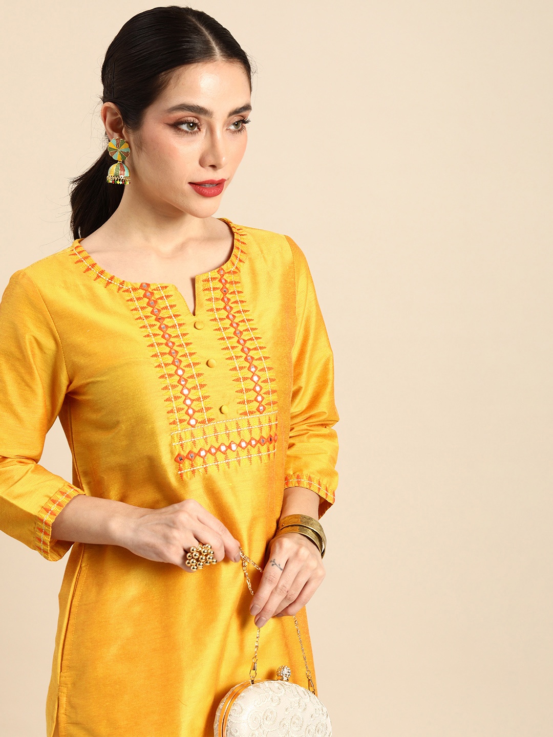 

Sangria Women Geometric Embroidered Mirror Work Kurta, Mustard