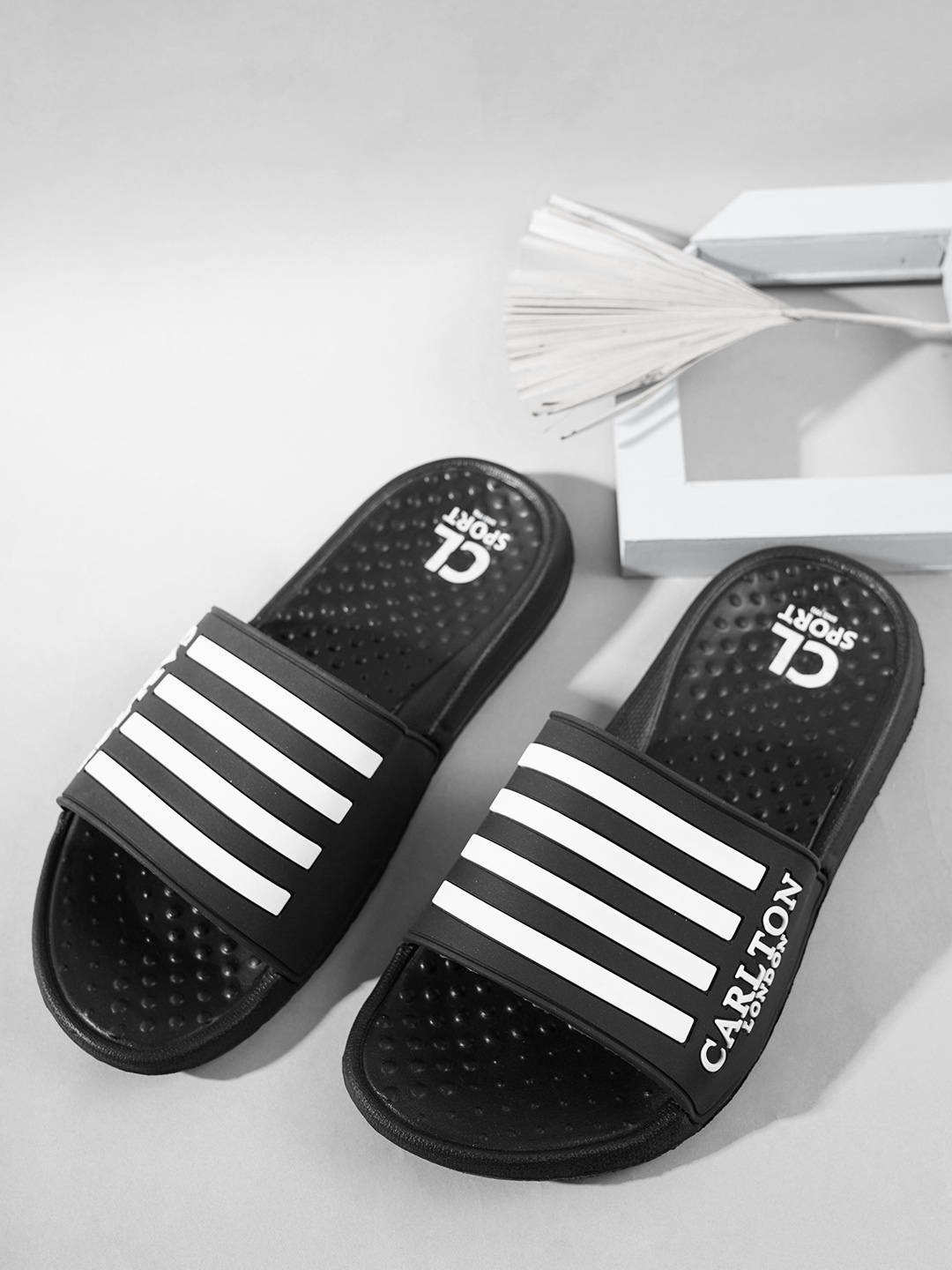 

Carlton London sports Men Striped Sliders, Black
