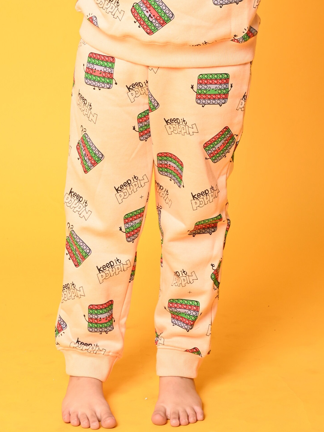 

Anthrilo Girls Printed Fleece Relaxed-Fit Joggers, Peach