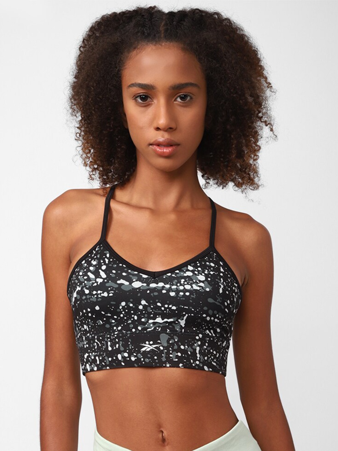 

Reebok Abstract Printed Lightly Padded Bra, Black
