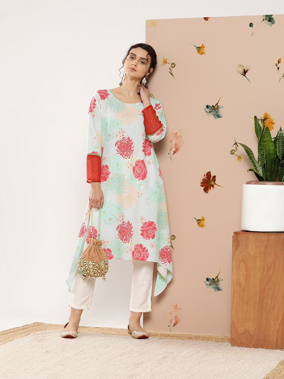 

Ahalyaa Women Turquoise Blue & Red Floral Printed Gotta Patti Floral Crepe Kurta