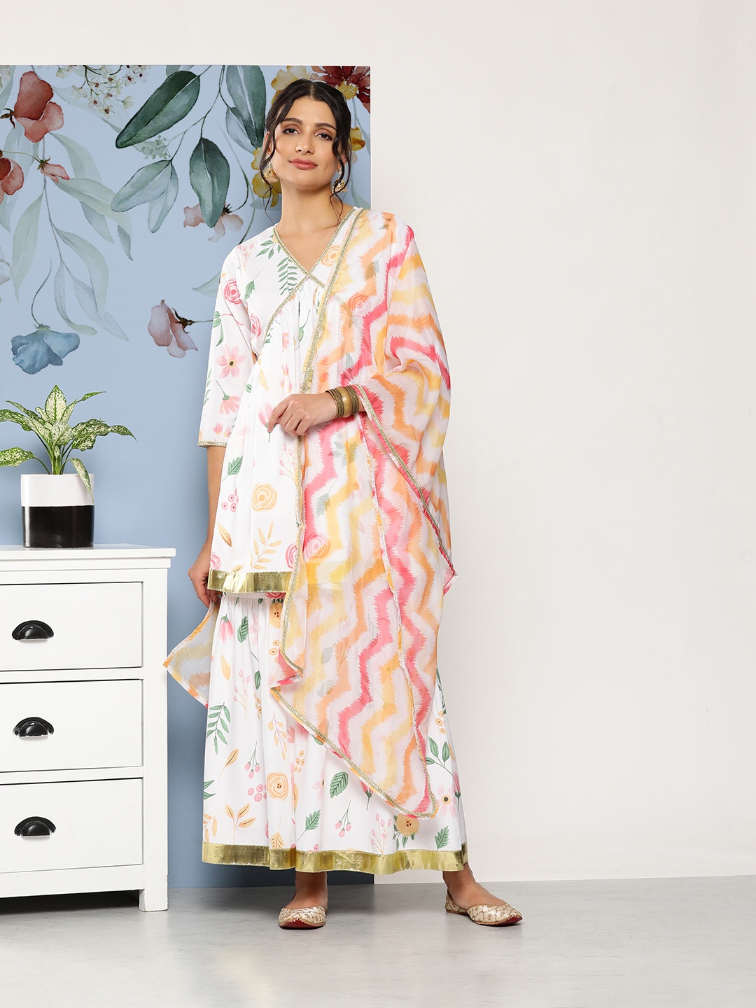 

Ahalyaa Women White Floral Printed Pleated Kurta with Sharara & With Dupatta