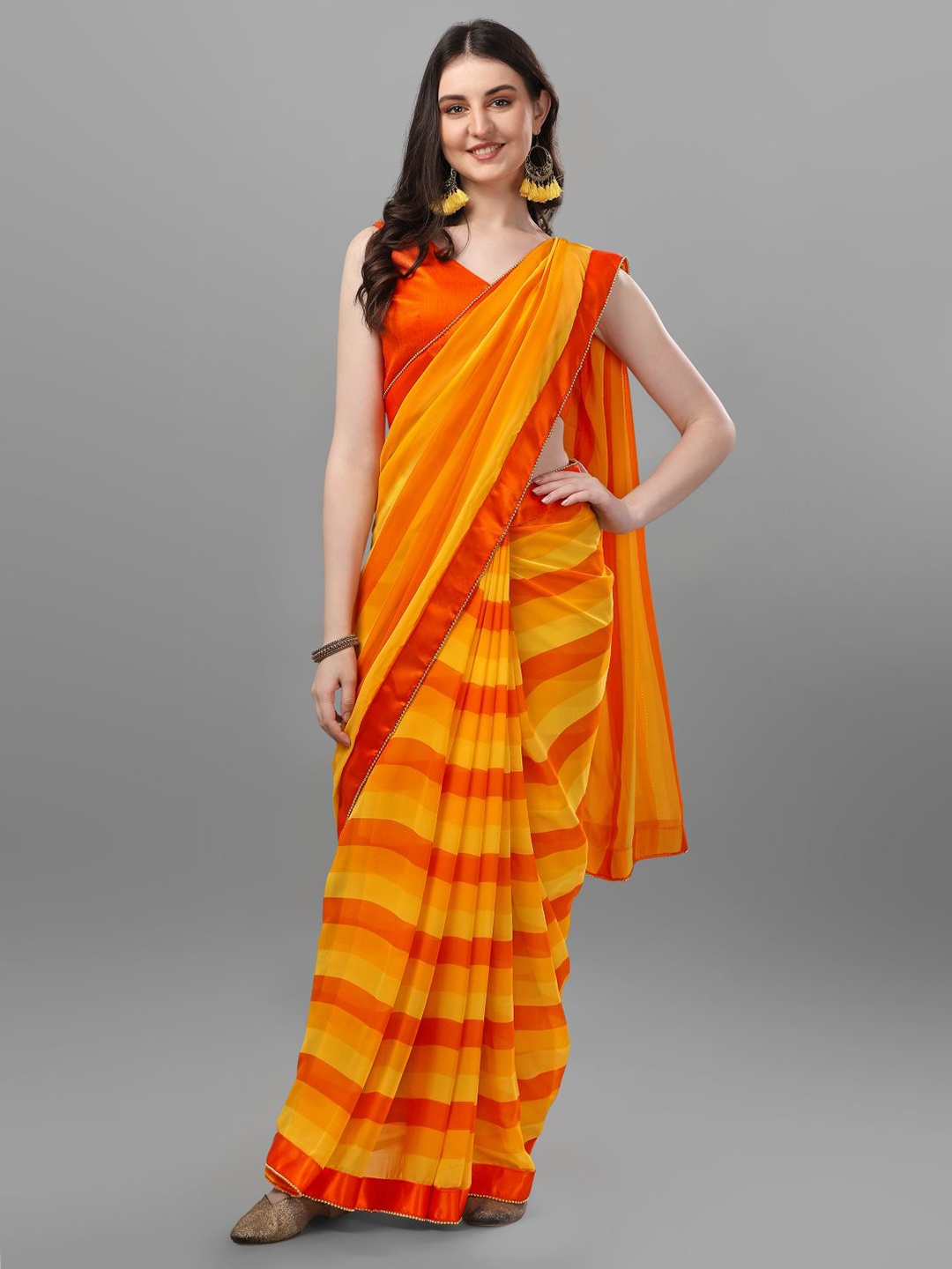 

B4ME COM Striped Pure Georgette Saree, Yellow