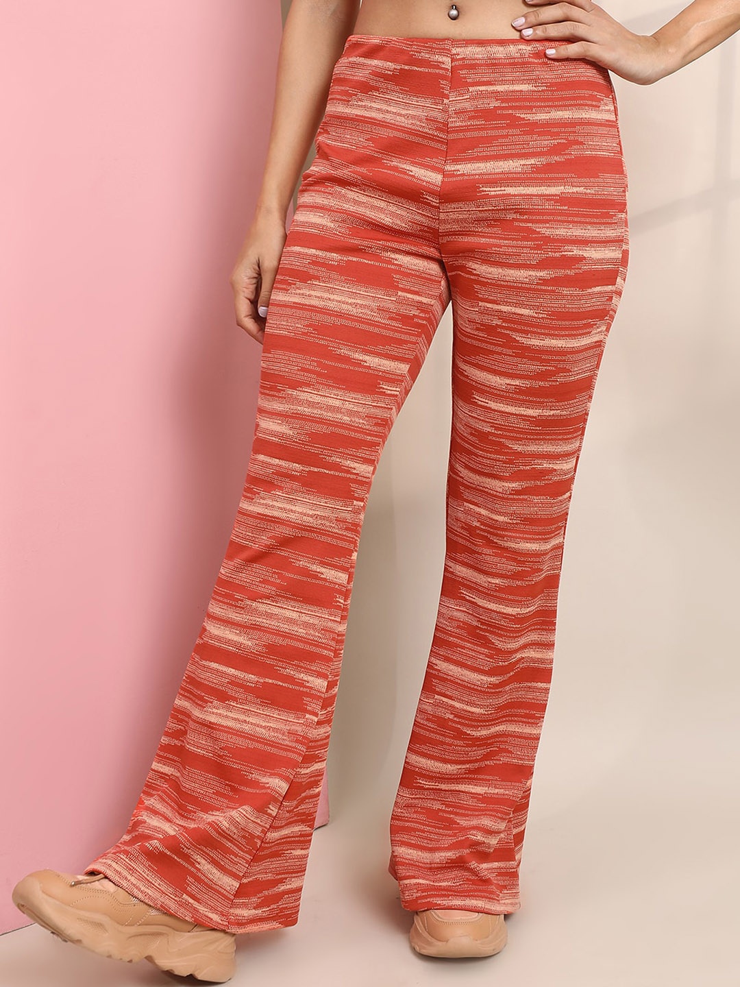 

Tokyo Talkies Women Printed Slim Fit Bootcut Trousers, Orange