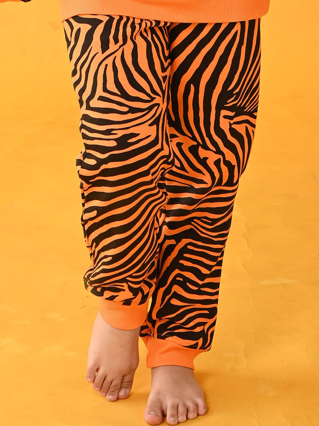 

Anthrilo Girls Zebra Striped Fleece Relaxed Comfort-Fit Joggers, Orange