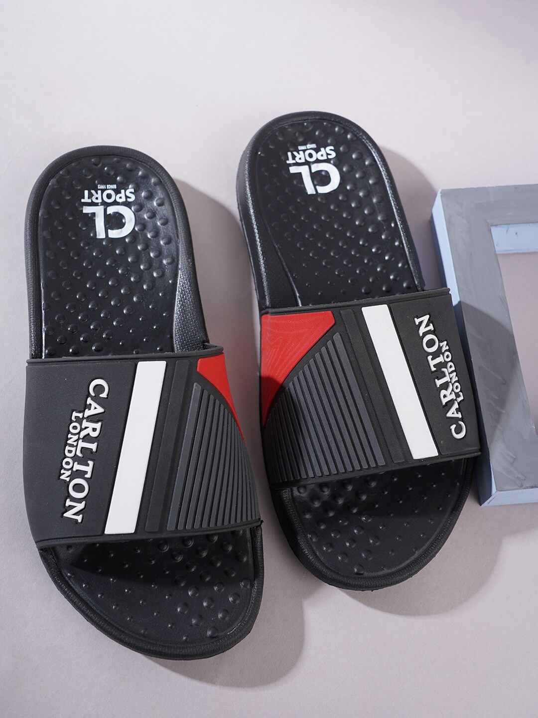 

Carlton London sports Men Printed Sliders, Black