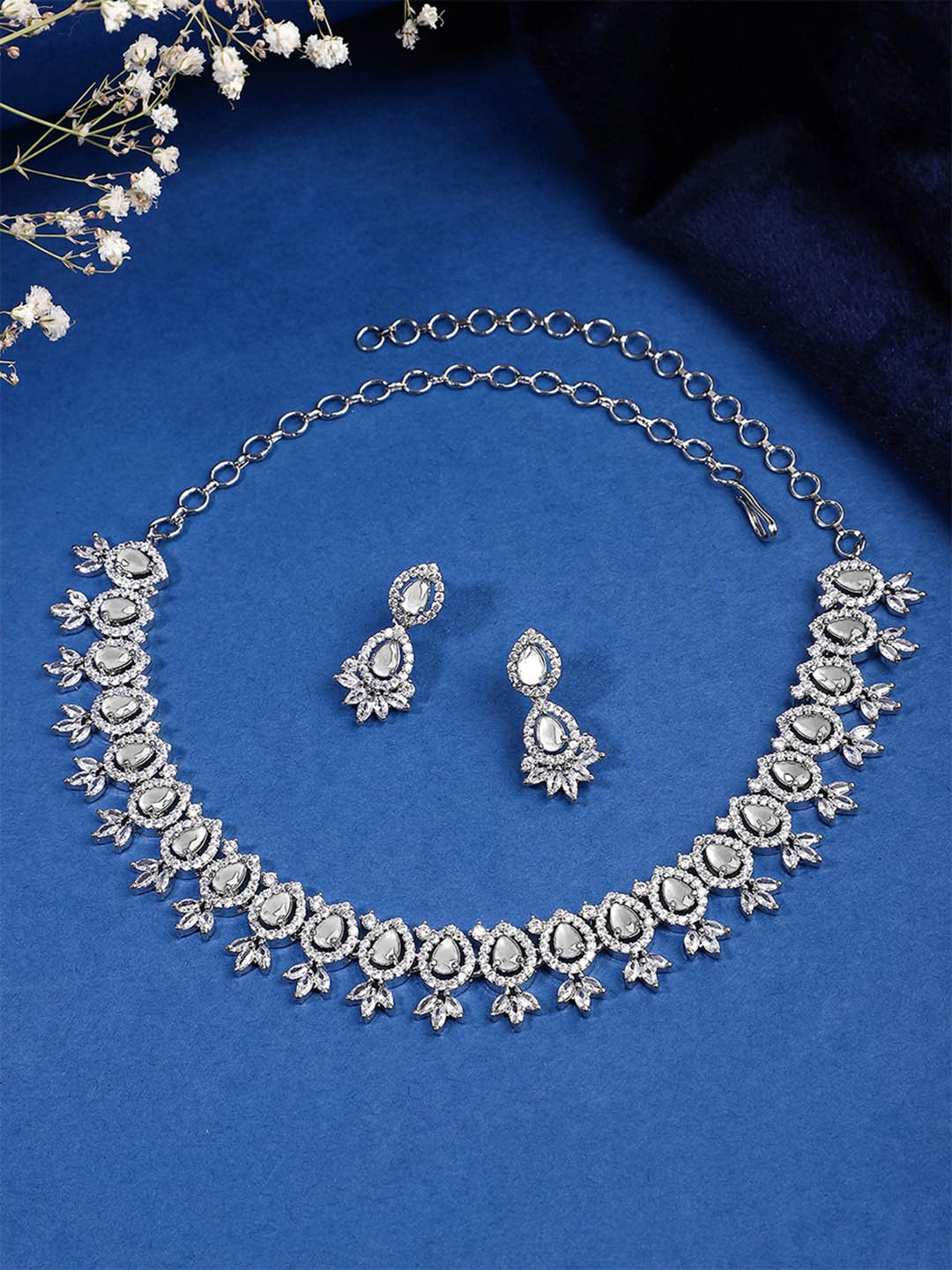 

Yellow Chimes Rhodium Plated American Diamond Studded Jewellery Set, White