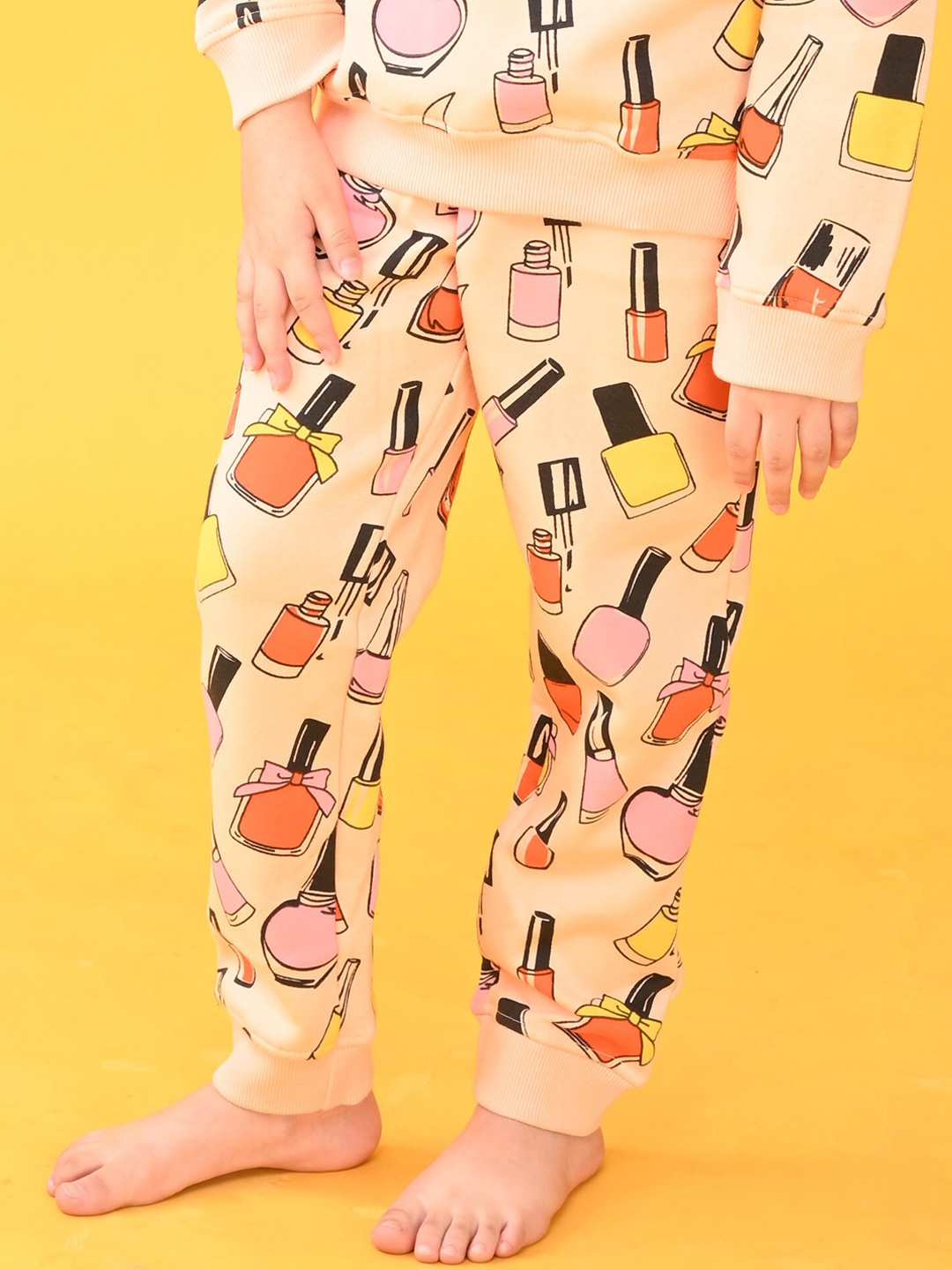 

Anthrilo Girls Nail-Paint Print Fleece Relaxed-Fit Joggers, Peach