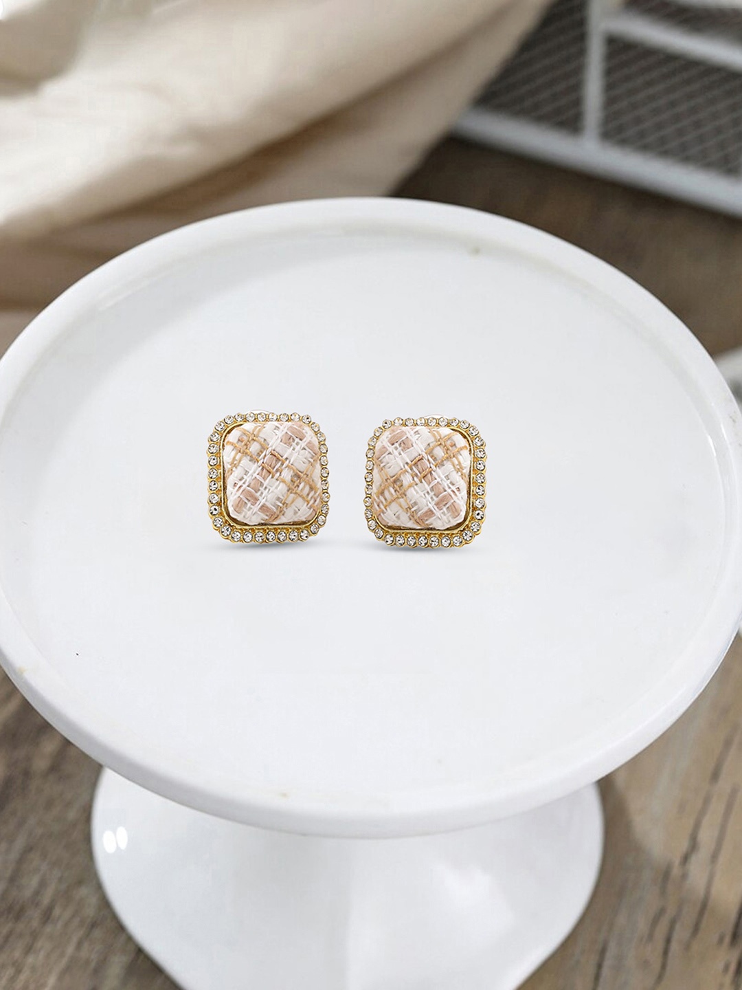 

Yellow Chimes Gold-Toned & White Contemporary Studs Earrings