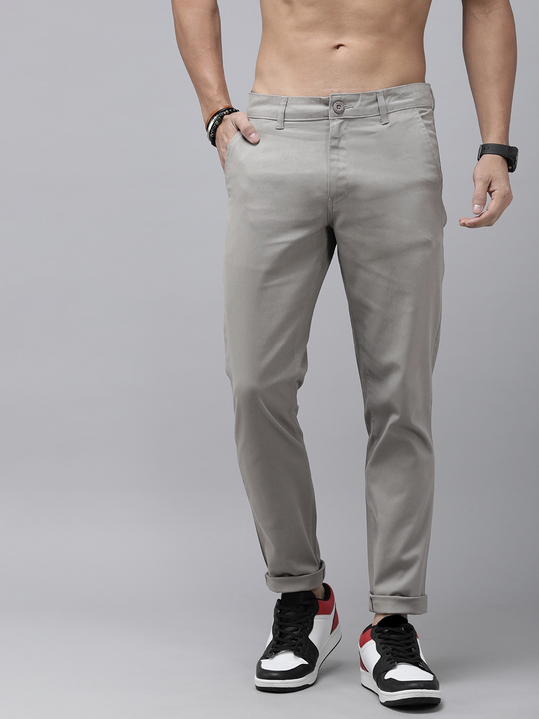 

The Roadster Lifestyle Co. Men Solid Regular Fit Casual Trousers, Grey