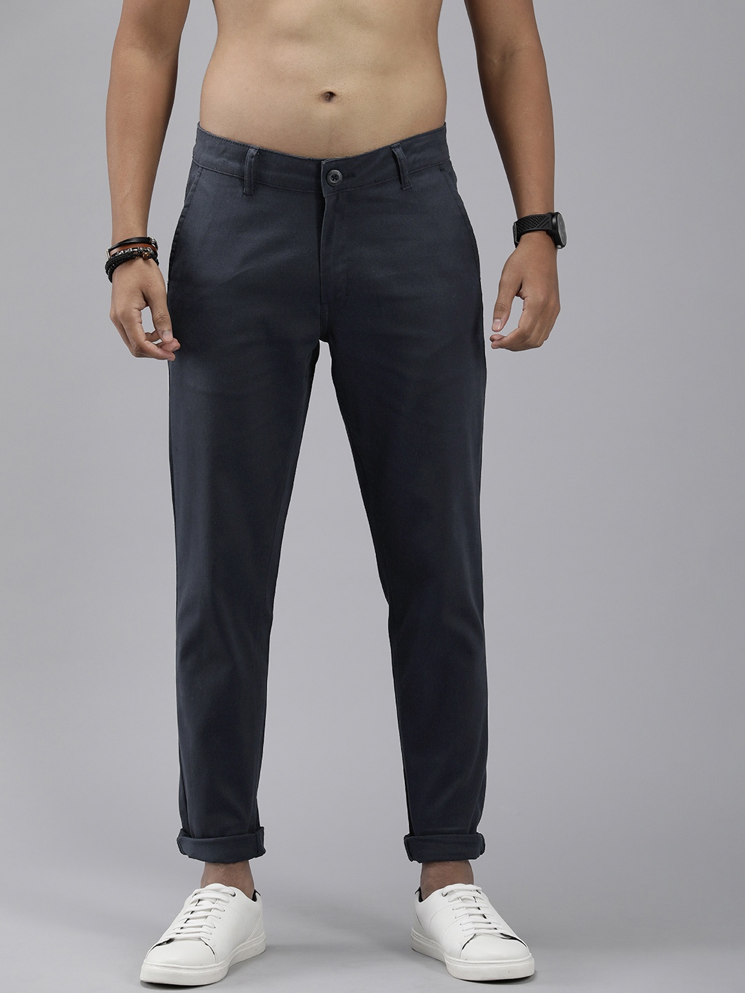 

The Roadster Lifestyle Co. Men Solid Low-Rise Flat Front Trousers, Navy blue