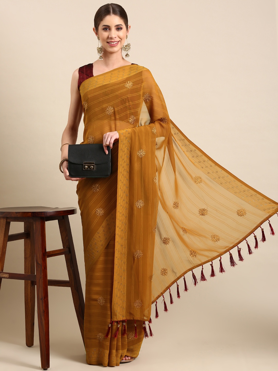 

Mitera Floral Beads and Stones Pure Georgette Saree, Mustard