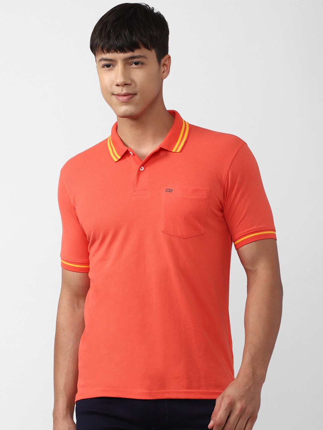 

Peter England Casuals Men Polo Collar T-shirt, Peach