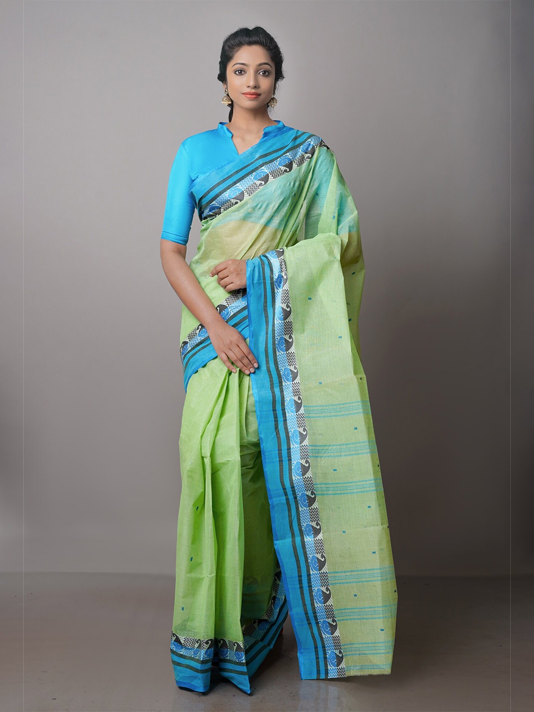 

Unnati Silks Green & Blue Woven Design Zari Pure Cotton Taant Saree