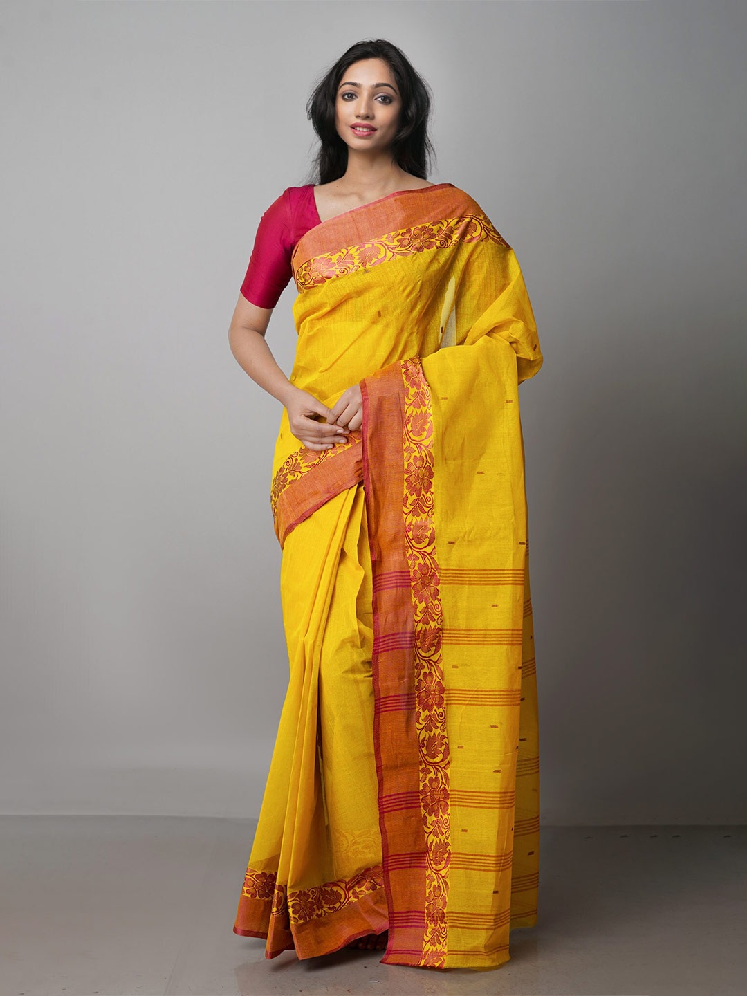 

Unnati Silks Woven Design Pure Cotton Taant Saree, Yellow