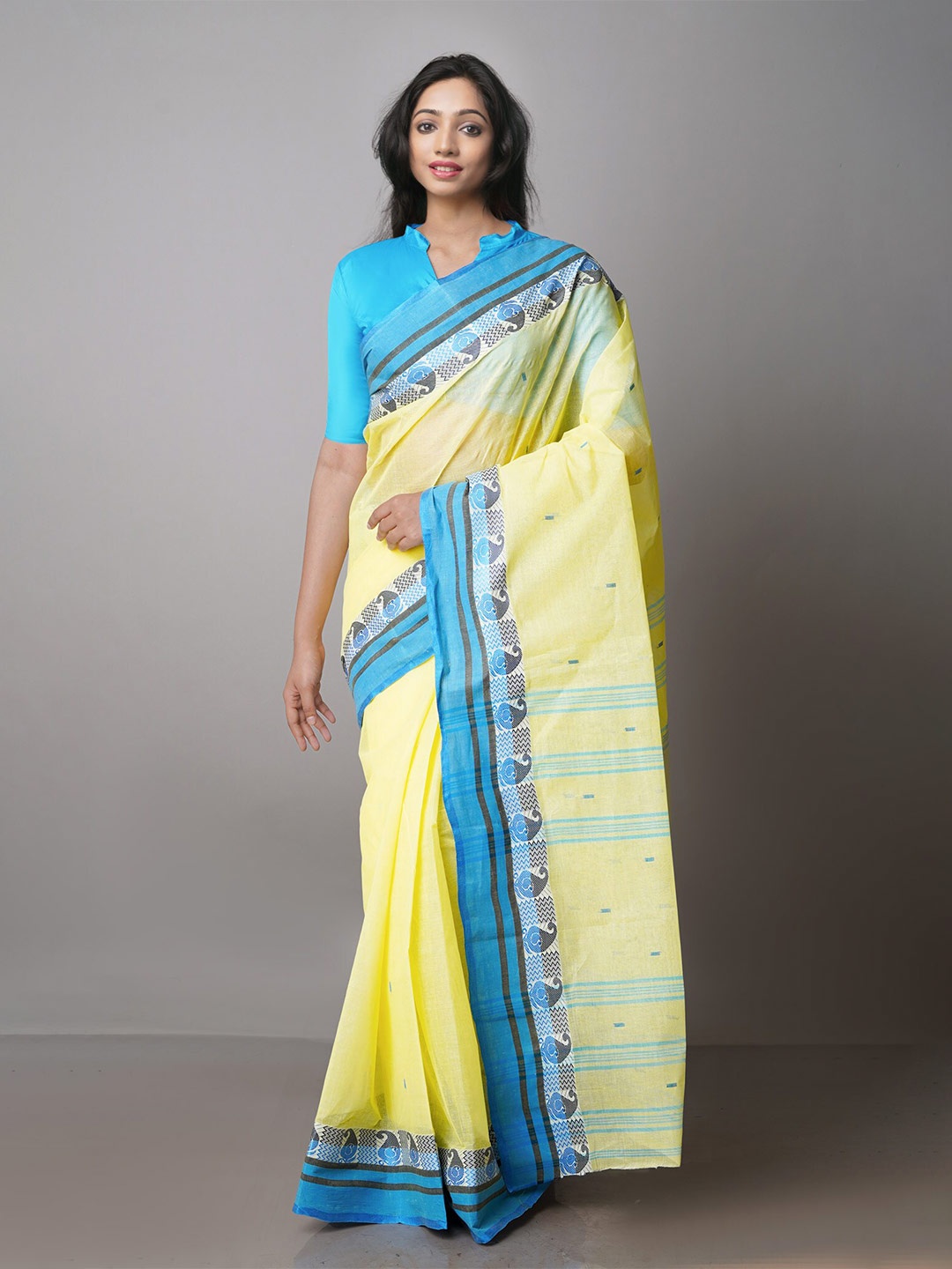 

Unnati Silks Woven Design Pure Cotton Taant Saree, Yellow
