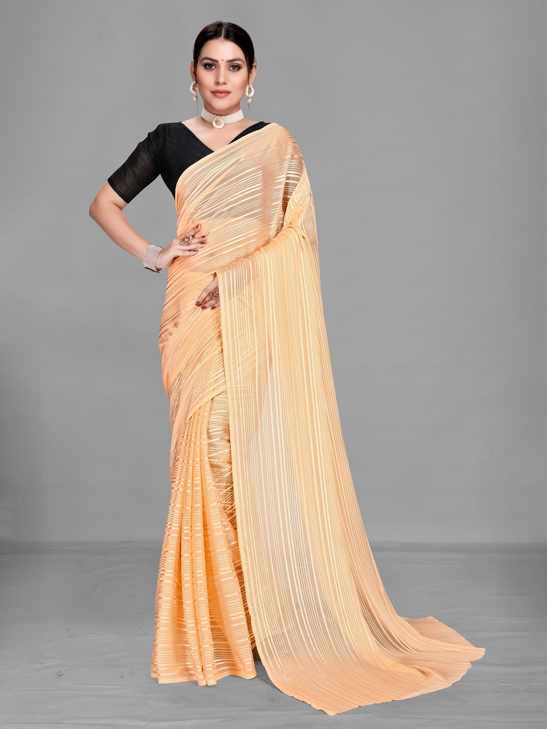 

Ethnic Yard Orange Striped Saree