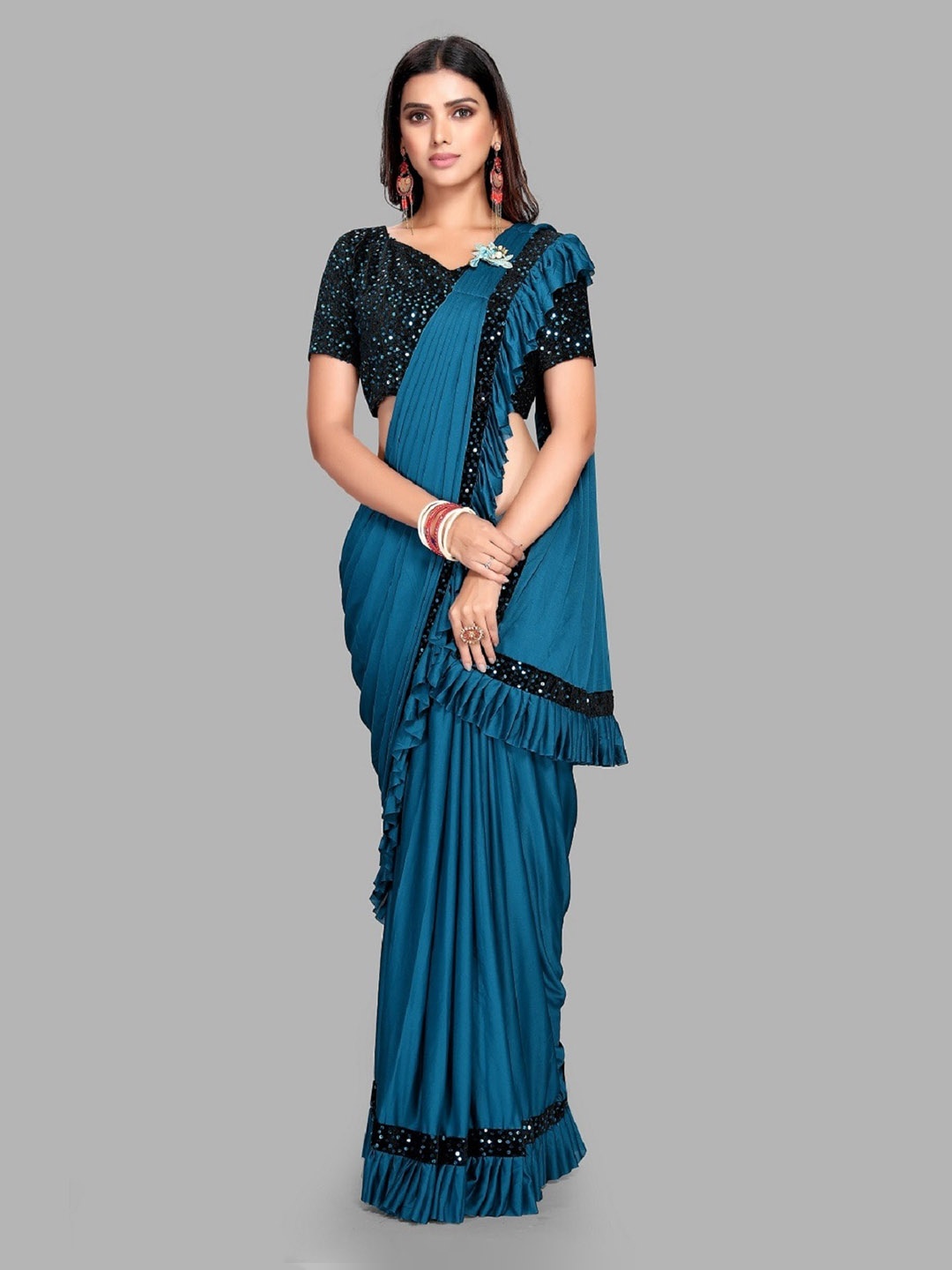 

Ethnic Yard Blue Sequinned Ruffled Saree